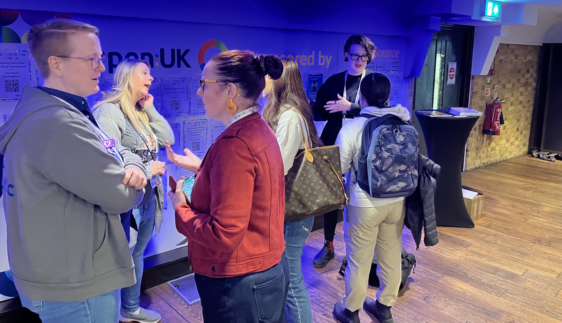 Group photo of Women of Open Source members at State of Open Con in London