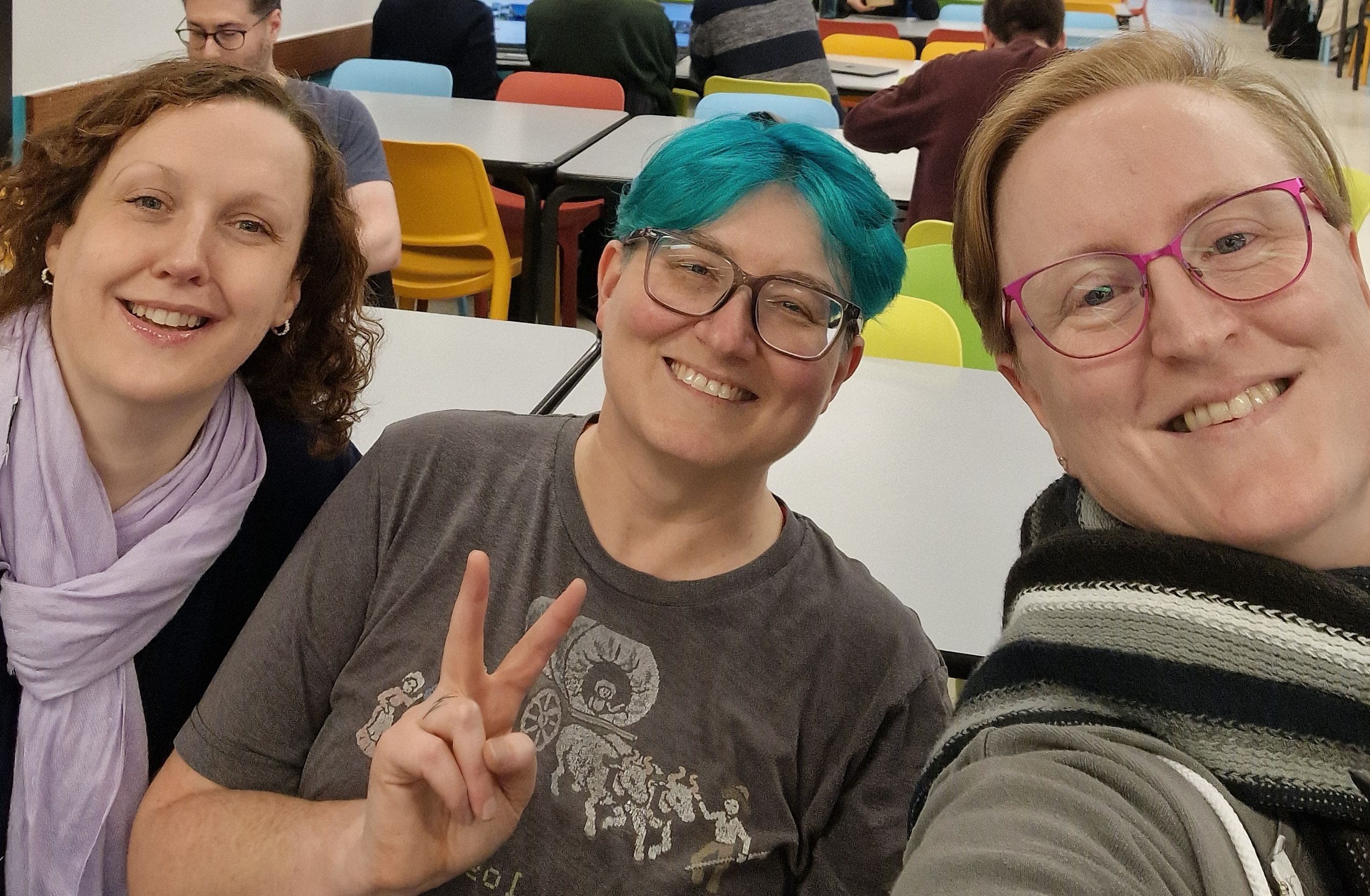 Group photo of Women of Open Source members at FOSDEM meetup